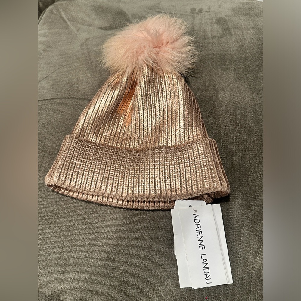 Adrienne Landau rose gold hat fox pom pom